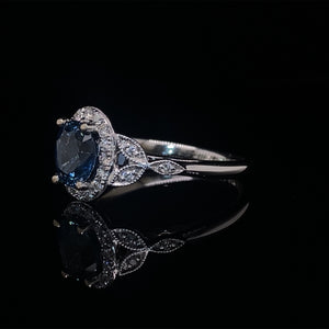 Oval Blue Sapphire and Diamond Halo Ring 14K White Gold